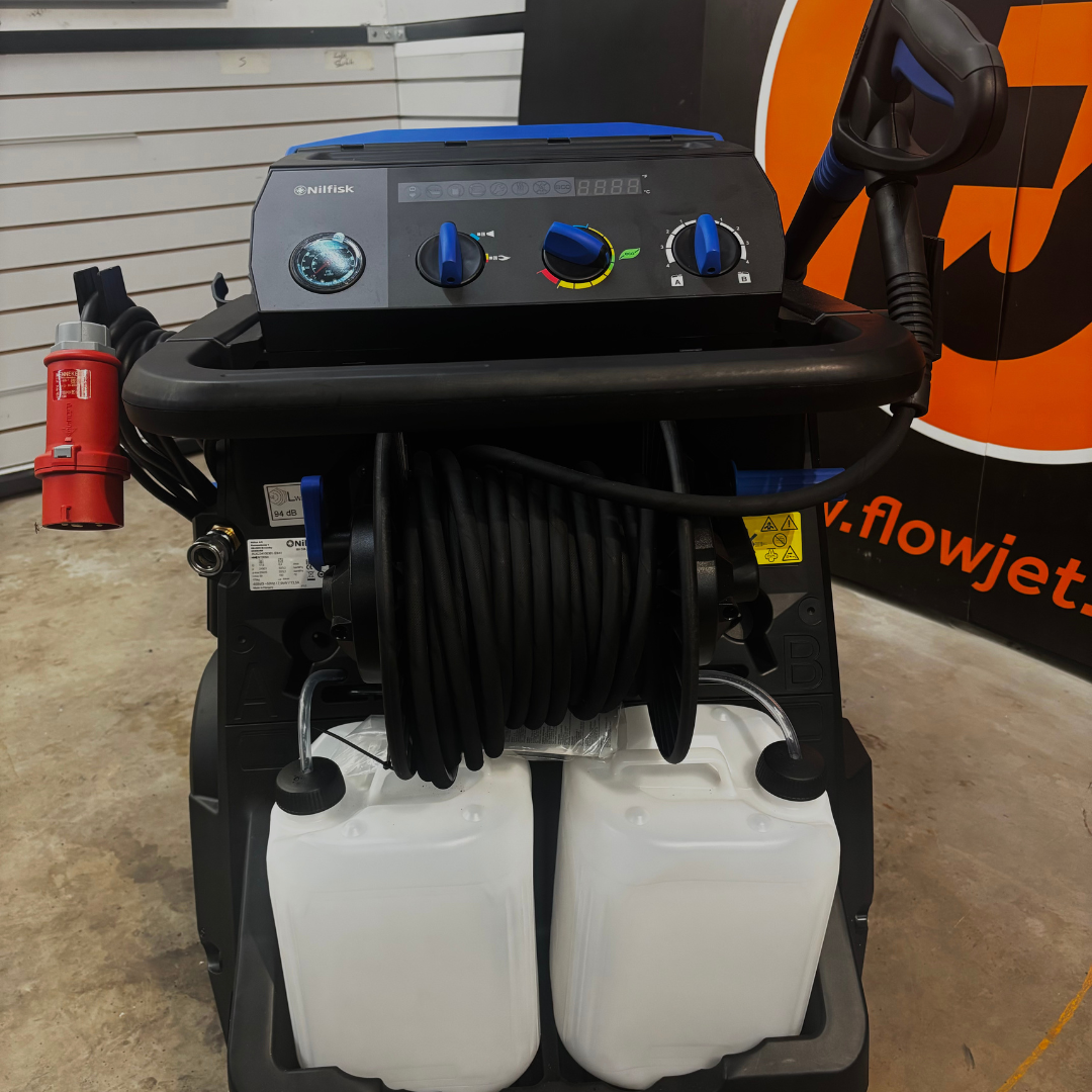 Rear view Nilfisk MH5M Flow Actuated Pressure Washer with hose and accessories, designed for high-efficiency cleaning.